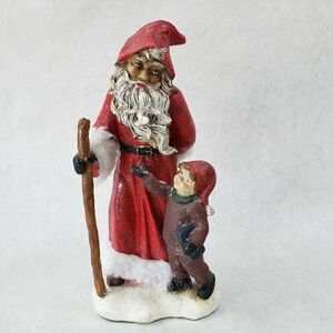 Santa Claus Statue Santa Walking with Boy Hidding a present 11"